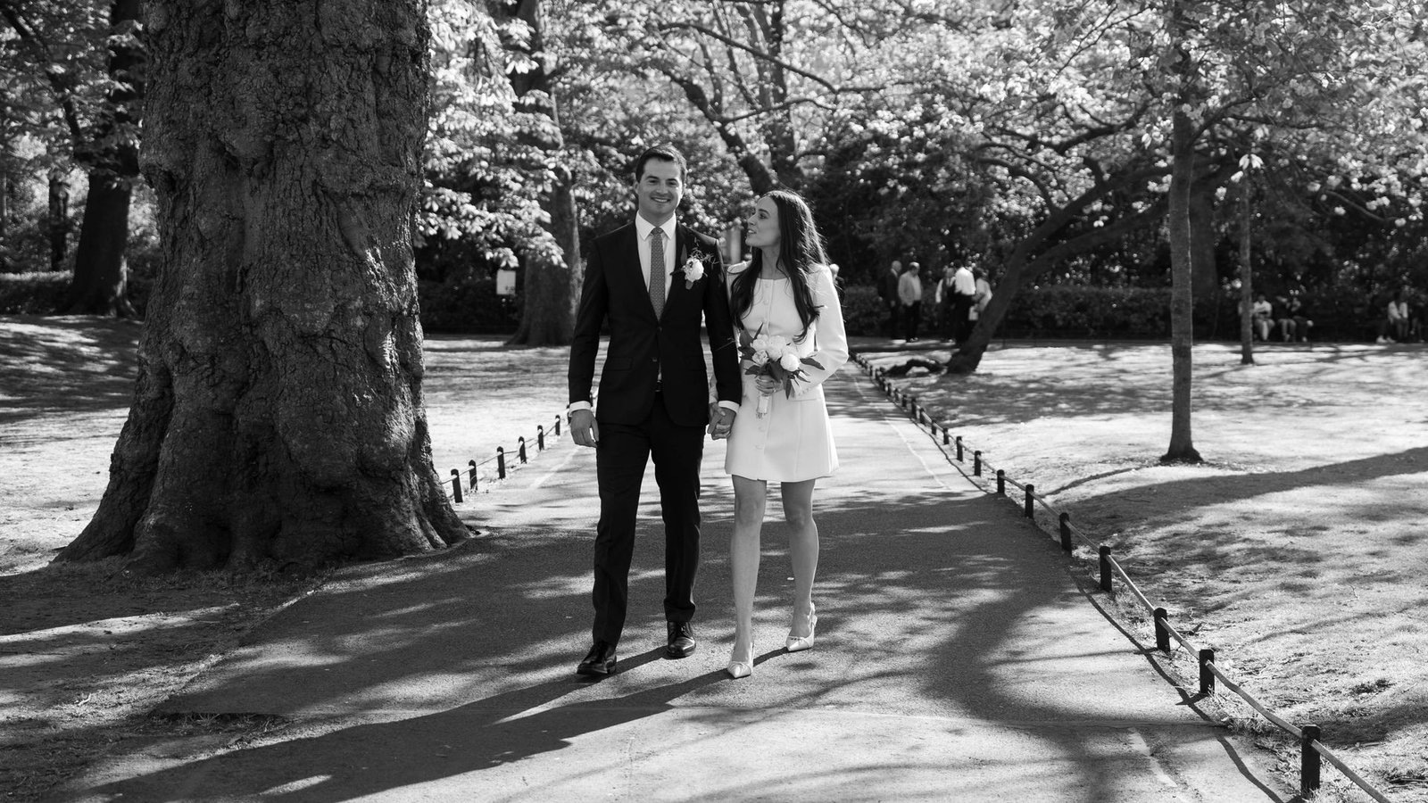 Just-married couple under cherry blossoms
